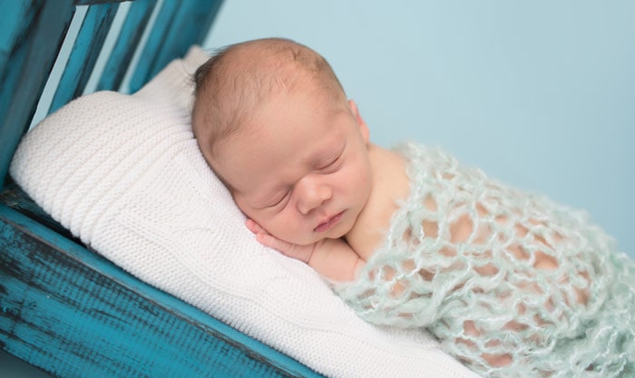 Baby Sleeping on Bed